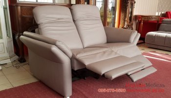 Новый кожаный диван реклайнер